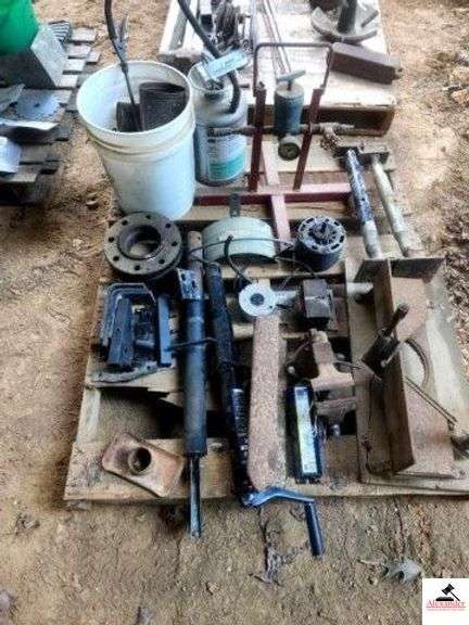 PALLET - RAILROAD IRON ANVIL 4" VICE - STEEL BRACKET AND GATE HINGES - TRAILER JACKS - USED ELECTRIC MOTORS - BUCKET OF NAILS - TWO SUPORT TANKS - SPRAYER - PRESSURE GAUE STAND - (IMP SHED) image