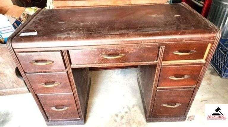 MAHOGANY WRITING DESK - 7 DRAWES - HAS SCRATCHES - SHOWS WEAR - NEEDS CLEANED AND REFINISHED (SHED) image