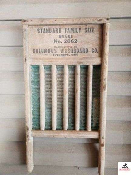 MAID-RITE COLUMBUS WASHBOARD CO BRASS WASHBOARD SMALL HOLE IN THE BRASS - RIBS ARE VERY EVIDENT, WOOD IS GOOD, WRITING IS CLEAR AND READABLE - (GARAGE) image