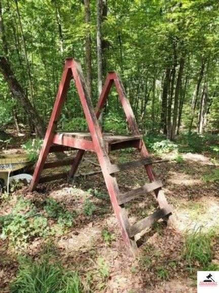 WOOD FENCE BRIDGE - 4X4 POSTS- 2X4 STEPS - COULD BE USED FOR DEER STAND - A FRAME CONSTRUCTION - 2 X 6 FLOORING - 28" WIDE - 4 STEPS HIGH - CLEARANCE ABOUT 40" - (WOODS) image