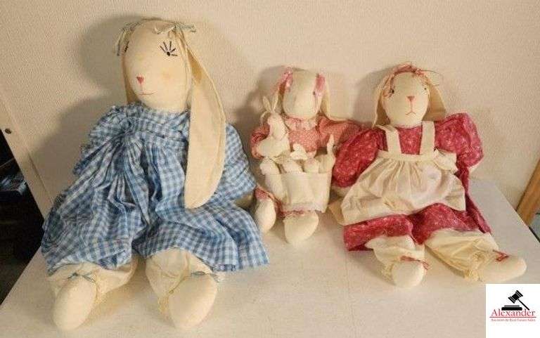 HANDMADE SOFT BODIED RABBIT DOLLS LARGE WITH BLUE DRESS - SMALL WITH BABY RABBITS IN PINK DRESS - MEDIUM SIZE IN RED DRESS - LITTLE RABBIT WITH DARK BLUE DRESS - CLEAN - COMES WITH BLUE TOTE (GARAGE) image