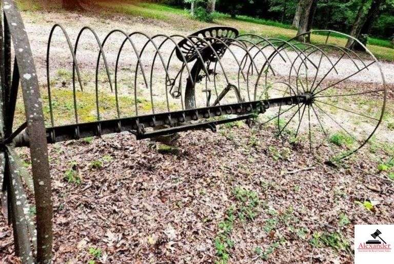 HORSE DRAWN HAY RAKE IRON WHEELS WITH METAL STAVES - DEERING SEAT CRACKED - SOME TEETH LOOSE - NO TONGUE (OUTSIDE) image