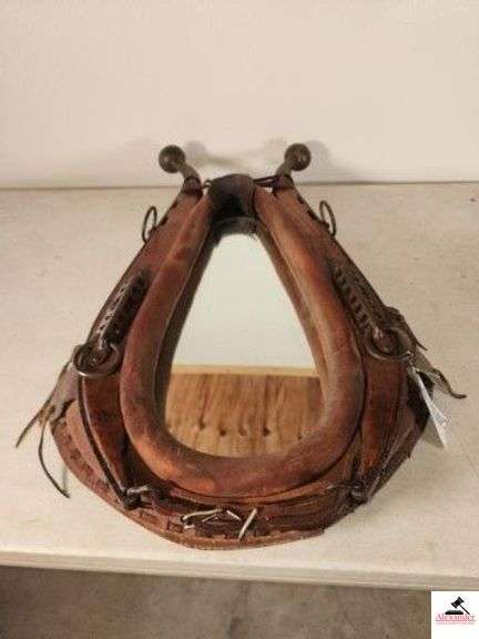 LEATHER HORSE COLLAR EXCELLENT CONDITION FOR AGE - OAK HANGS WITH LARGE BRASS KNOBS - GOOD LEATHER BANDS AND MIRROR - COLLAR HAS BEEN USED - SHOWS SLIGHT WEAR ON BACK SIDE - LEATHER HAS DRIED AND DIVIDED AT LOWER SEAM - (GARAGE) image