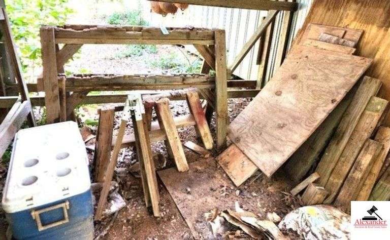 WOOD SAW HORSES - 2 AND HALF LARGE AND SMALL - USED - ASSORTMENT OF LUMBER - MISC. ITEMS ON PALLET - 2X4 PCS. - 76" WIDE X 37" DEEP - (IMP. SHED) image