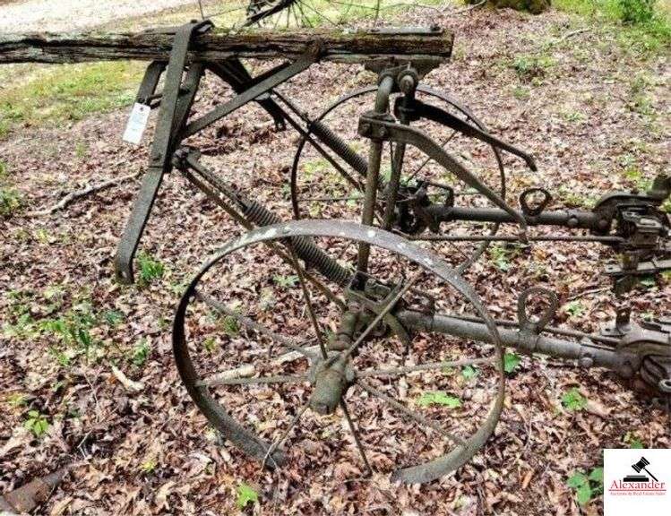 HORSE DRAWN WALKING CULTIVATOR 4 SCRATCHERS ON BACK - NO TONGUE - HANDLES DETERIORATED - TWO METAL WHEELS - (OUTSIDE) image