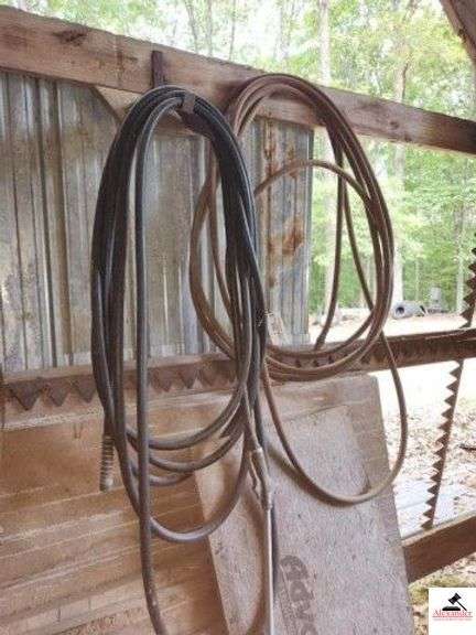 RUBBER HOSE WITH SPRAY NOZZLE-RED HOSE GREEN & RED HOSES - (IMP SHED) image