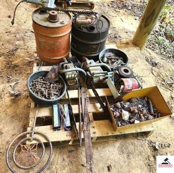 PALLET - CHAINSAWS - BOLTS - NAILS GRINDING BRUSHES - TWO DRUMS - USED TOOLS - STEEL AND COPPER YARD ORNAMENT - (IMP. SHED) image