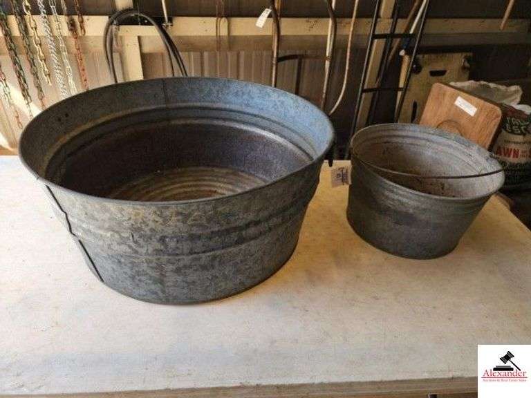 GALVANIZED TUB #EW3 - SHOWS ALITTLE RUST IN BOTTOM - GALVANIZED WATER BUCKET WITH VAIL - 5 SCREW HOLES BORED IN BOTTOM - (SHED) image