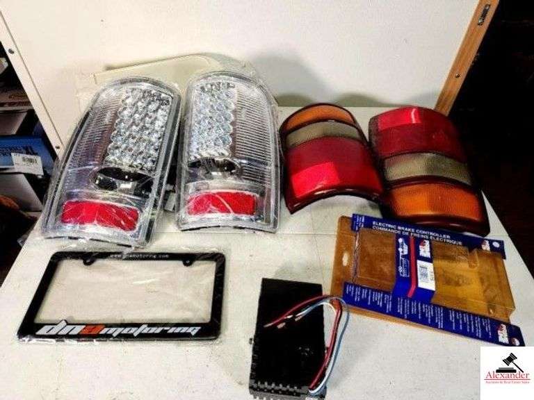 PRIME LINE ELECTRIC BRAKE CONTROLLER APPEARS NEW - DNA MOTORING LICENSE PLATE COVER - PAIR OF NEW '06 CHEVY SURBURBAN 1500, 2500, CHEVY TAHOE, GMC YUKON, GMC YUKON XL, 1500, 2500, FITS LIFTGATE MODEL REAR DOORS ONLY,  LED CROME TAIL LIGHTS - USED TAIL LIGHTS - (UPSTAIRS) image