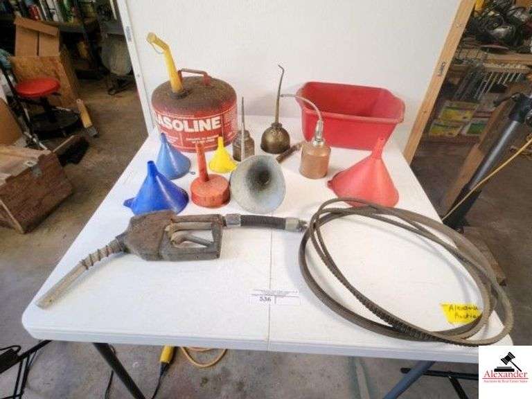 RED GAS CAN - FUNNELS - 3 METAL OIL CANS - GAS NOZZEL - 3 FAN BELTS - (IN GARAGE) image