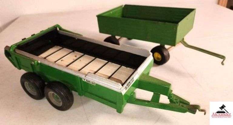 METAL FRONTIER MANURE SPREADER ERTL 4-WHEEL METAL WAGON (ONE WHEEL BROKEN OFF) - (GARAGE) image
