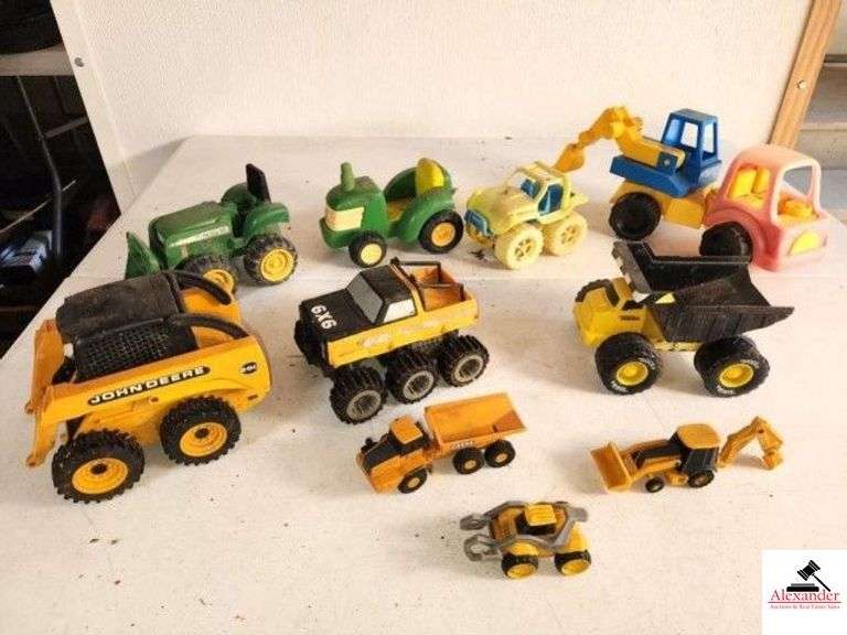 (10) PLASTIC TOYS JOHN DEERE PLASTIC GRAVEL TRUCKJOHN DEERE SKID STEER - BUCKET MISSING - 6X6 TRUCK - JOHN DEERE TRACTOR - TONKA GRAVEL TRUCK - PLASTIC DEERE TRUCK WITH BACK HOE AND DIGGING BUCKET - DEERE BACKHOE - DEERE GRAPPER - (GARAGE) image