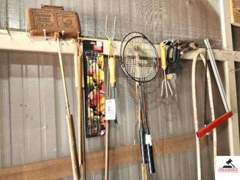 DOUBLE SOUGHTED PRY IRON BBQ TONGS - HOT DOG TONGS - GARDEN TOOLS - SCISSORS - TREE SAW - WALL HOSE - (2) BATMINTON RACKETS - (DETATCHED GARAGE) image