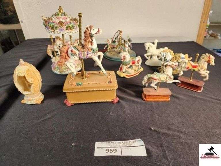 MUSICAL CAROUSEL MERRY-GO-ROUND & PIECES WOULD NOT PLAY AT TIME OF TEST - (5) INDIVIDUAL CAROUSEL HORSES (2) ON WOOD STAND - (2) ROCKING PORCELAIN HORSES - (1) PORCELAIN STABLE HORSE - CAROUSEL HORSE INSIDE PORCELAIN  EGG - LARGE SINGLE CAROUSEL PORCELAIN HORSE MUSIC BOX (PLAYS) - CAROUSEL WITH 2 GRAY & 2 WHITE HORSES - (GARAGE) image