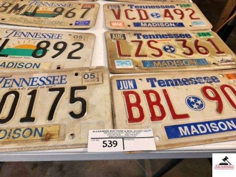 (15) OLD TENNESSEE LICENSE PLATES - '93-'94-2000 2001 - 2005 2006 2010 2018 2023 - (4) ADV. SIGNS - CO-OP - MADISON & HENRY CO. (TRAILER) image