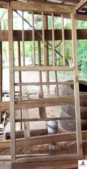 VINTAGE WOODEN SCREEN DOOR 36"W X 80"T - SCREEN HAS HOLE AND BARS ARE LOOSE - (IMP. SHED) image