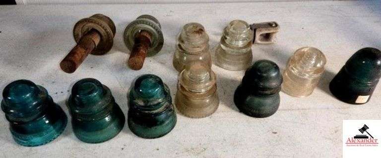 (11) GLASS INSULATORS HEMMINGWAY GREEN & CLEAR #42 - CSA CLEAR - WHITE ALL-TATUM CO - (2) WITH WOOD CONNECTION, 1 CHIPPED - WIRE BASKET & PORCELAIN CONNECTOR - (GARAGE) image