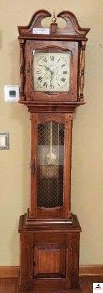 THE "ABEL COTTEY" GRANDFATHER'S CLOCK - 8 DAY WEIGHT DRIVEN MOVEMENT WITH CHIMES BY THE NEW ENGLAND CLOCK COMPANY - NO. NE#108 -17" X 75"  - PAINTED FACE WITH ROMAN NUMERAL - BONNET TOP - DECORATIVE TURNED SPINDLES AND GLASS FRONT - BRASS WEIGHTS, PENDULUM &(LR) image