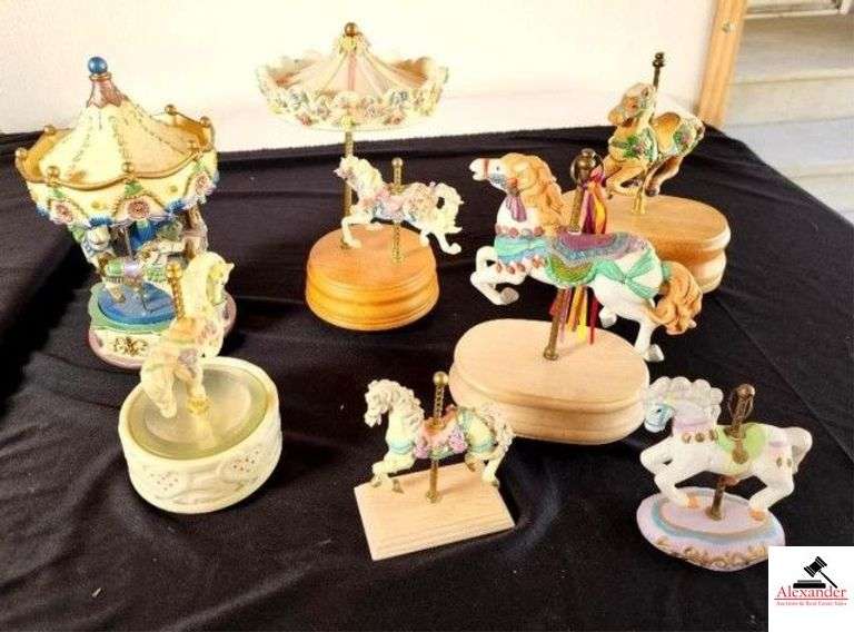 PLASTIC BATTERY OPERATED CAROUSEL CONDITION UNKNOWN - SMALL CAROUSEL HORSE WITH ROTATING CANOPY TOP & MUSIC BOX (WORKS) - CAROUSEL HOUSE WITH WOOD BASE (WORKS) - CAROUSEL HORSE WITH WOOD BASE, ROTATES-TUNE IS "ITS A SMALL WORLD" - (2) SMALL CAROUSEL HORSES - (GARAGE) image
