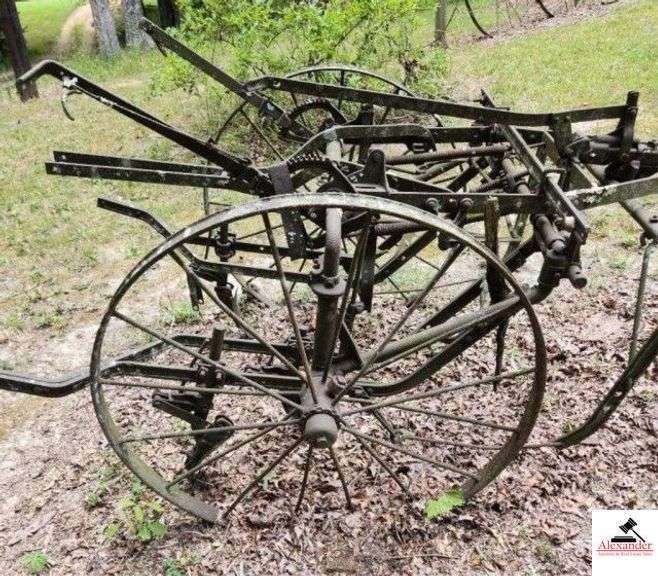 HORSE DRAWN RIDING CULIVATOR STEEL TONGUE - NO SEAT - STEEL ADJUSTMENT HANDLES - IRON WHEELS  - (OUTSIDE) image