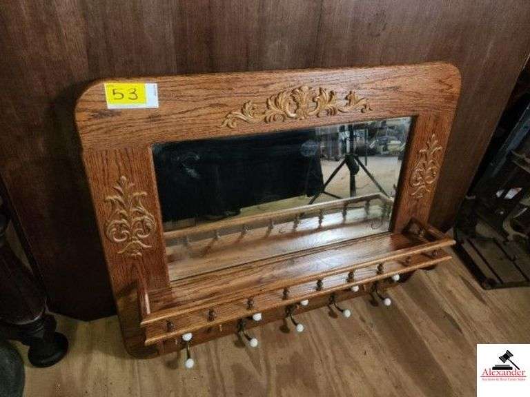 OAK COAT RACK WITH PULLS NATURAL FINISH - DOUBLE EDGED MIRROR - SHOWS A FEW SPOTS OF BLACK - BRASS & PORCELIAN PULLS - HAS A GALLY RAIL - 5 COAT HANGERS -  (UPSTAIRS) image