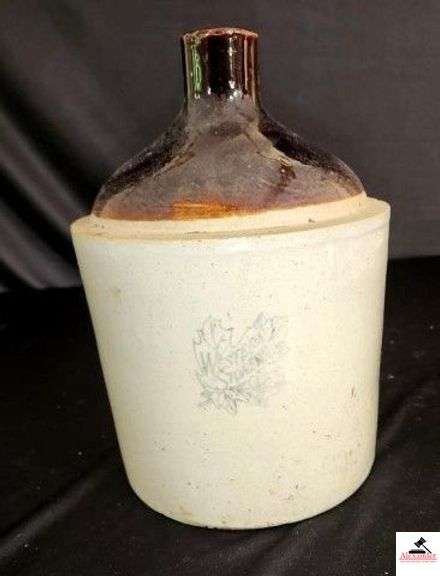 WESTERN STONEWARE JUG W/ HANDLE - BROWN AND WHITE - BLUE LEAF WITH NAME ON FRONT - FEW LIGHT CHIPS ON RIM - (KITCHEN) image