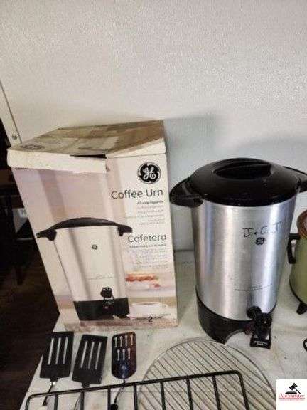 GE COFFEE URN 42-CUP CAPACITY WITH CORD CROCPOT SLOW COOKER WITH CORD - (2) MEAT RACKS - SPATULAS - BBQ FORK - MISC SILVERWARE - UTINSIL TRAY- (UPSTAIRS) image