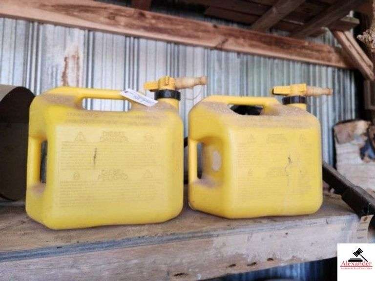 (2) YELLOW DIESEL GAS JUGS- 5 GALLON - (IMP. SHED) image