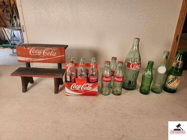 COCA-COLA BOTTLES MEMORBILLIA  AND BENCH 6 COKE CLASSIC 8OZ IN PAPER CARTON - 3 EXTRA COKE BOTTLES - 32OZ BOTTLE - WORN RC BOTTLE - SPRITE BOTTLE - MELLO YELLO BOTTLE - (GARAGE) image