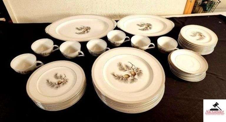 KENT "SILVER PINE" CHINA - MADE IN JAPAN (8) VEGATABLE BOWLS, 1 CHIPPED - ROUND SERVING BOWL - OBLONG SERVING BOWL - GRAVY BOAT - (8) SMALL BOWLS - (7) DINNER PLATES - (7) CUPS - (7) SAUCERS, 1 IS CHIPPED - (8) CAKE PLATES - LARGE SERVING PLATTER - MEDIUM SERVING PLATTER -  (GARAGE) image