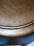 3 notch Lodge, heat ring #6 cast iron skillet, MM 2. CASTING IMPERFECTION; NOT CRACKED!