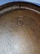 3 notch Lodge, heat ring #6 cast iron skillet, MM 2. CASTING IMPERFECTION; NOT CRACKED!