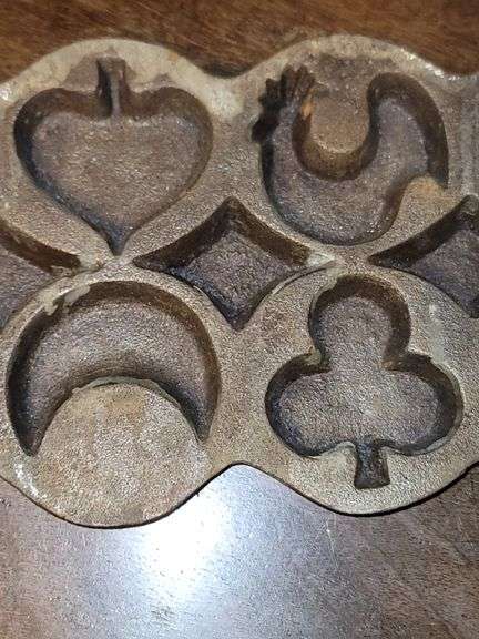 Vintage Cast Iron Cookie Baking Molds with Heart, Christmas Tree, Rooster, Moon, Star, House, and more.