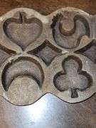 Vintage Cast Iron Cookie Baking Molds with Heart, Christmas Tree, Rooster, Moon, Star, House, and more.