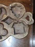 Vintage Cast Iron Cookie Baking Molds with Heart, Christmas Tree, Rooster, Moon, Star, House, and more.
