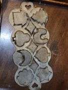 Vintage Cast Iron Cookie Baking Molds with Heart, Christmas Tree, Rooster, Moon, Star, House, and more.