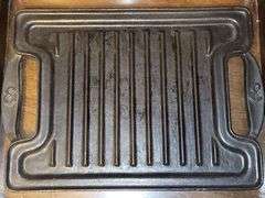 Cast iron Emeril griddle, double sided (ridged and flat).