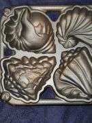 John Wright cast iron seashell gem pan. New never used