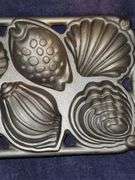John Wright cast iron seashell gem pan. New never used