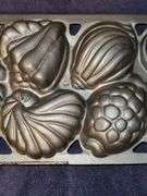 John Wright cast iron seashell gem pan. New never used