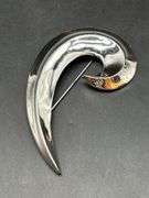 Chrome finish spiral swoosh brooch