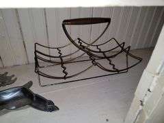 Items in cabinet: plastic red ware, Krups, reindeer tray and more