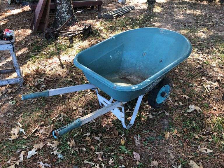 Large Ground Work Pro Series wheelbarrow. 62” front to end of handles. 42.5” L x 33” W tub. Needs new tires and handle grips. image