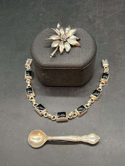 (3) pieces of vintage sterling jewelry…..daisy brooch, onyx-like bracelet and silver salt spoon brooch…..38 total grams image