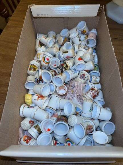 Large collection of ceramic and porcelain thimbles…..too many to take individual pics so please see sampling pics image