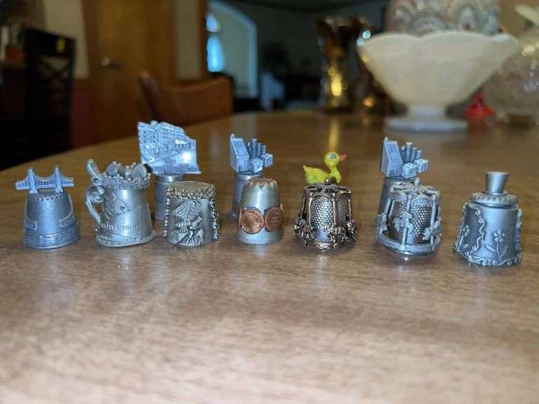 Grouping of very decorative pewter thimbles image