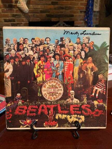 (4) copies of The Beatles “Sgt. Pepoers Lonely Hearts Club Band albums and (1) cover (very last pic) image