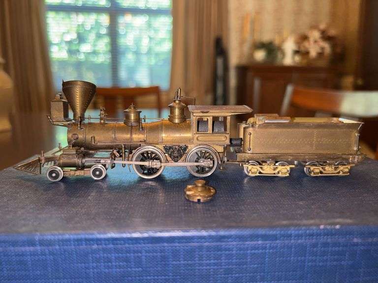 United HO Brass V&T No. 11 Reno 4-4-0 Steam Locomotive & Tender OB…..smoke stack is loose and has 1 piece that needs reattached on Locomotive…..in original box