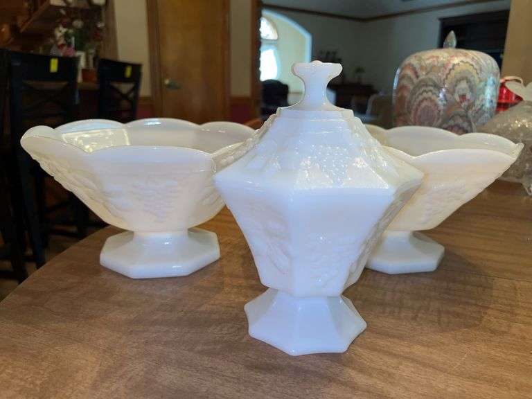 3-piece set of Vintage Anchor Hocking Milk Glass Grape Leaf Pattern pieces…..each fruit bowl is 9”D x 5-1/4” tall…..lidded candy dish is 8” tall image