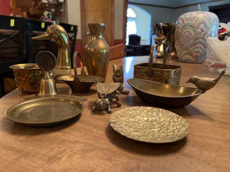 Grouping of brass trinket trays, (1) duck head bookend, basket and more image